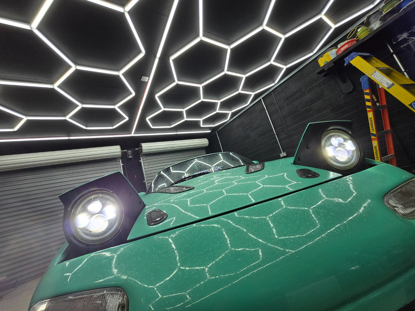 Garage after: hexagonal LED ceiling